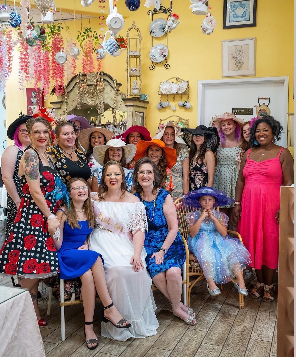 A bridal tea party with colorful hats and floral decorations at The Tea Terrace in Las Vegas