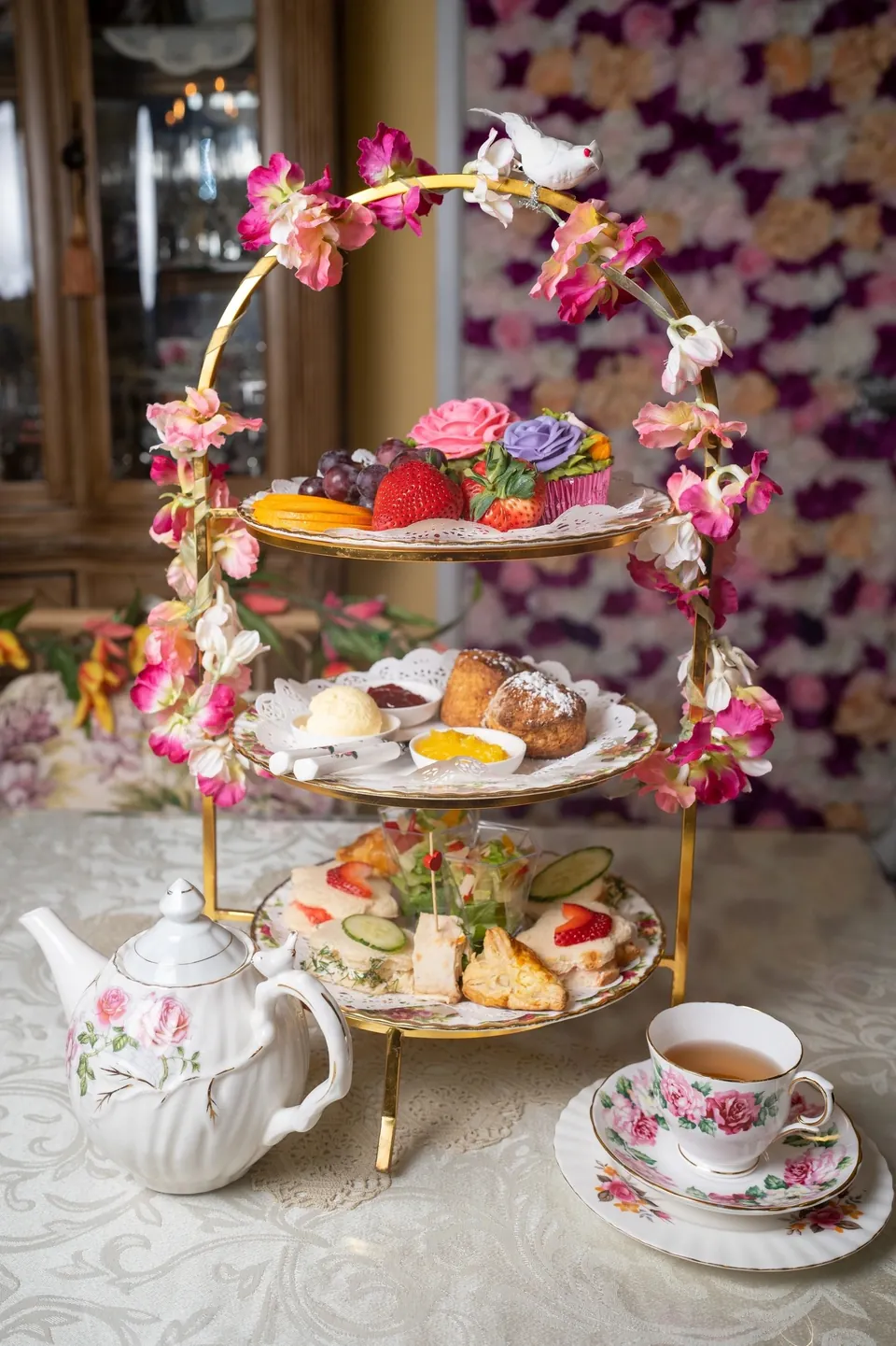 Queen's Afternoon Tea with tiered sandwiches, scones, desserts and a teapot
