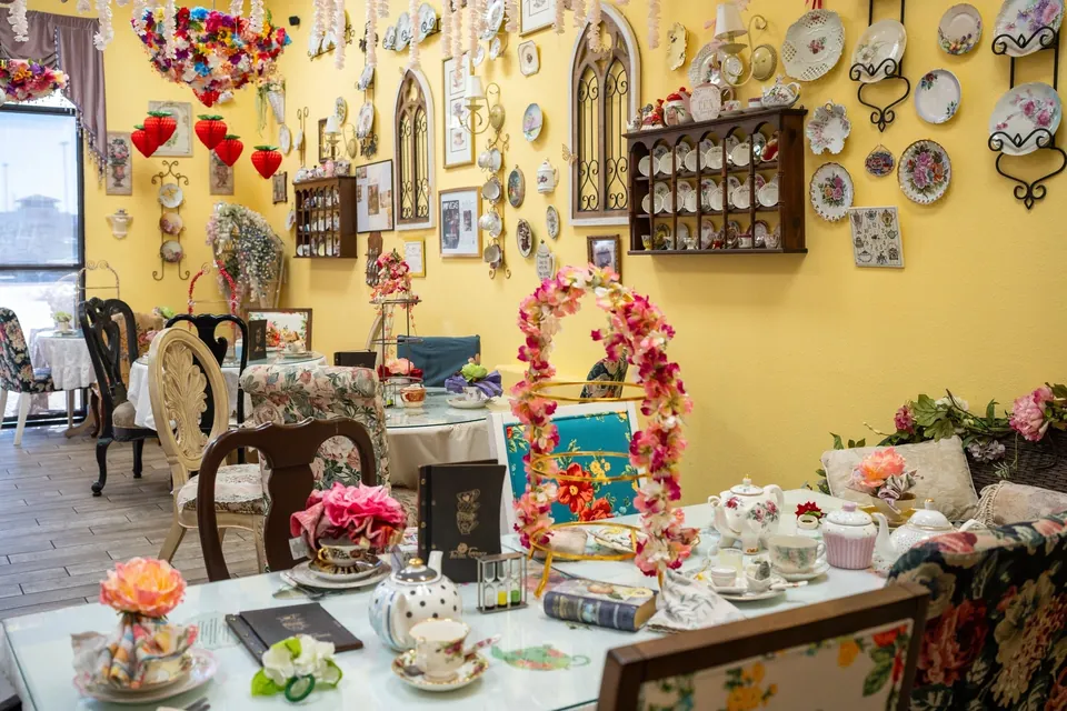 Afternoon tea tables and colorful china in The Tea Terrace tea room